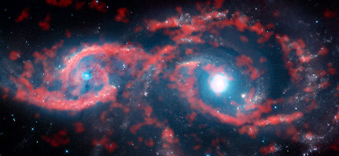 Tsunami of Stars and Gas Produces Dazzling Eye-shaped Feature in Galaxy