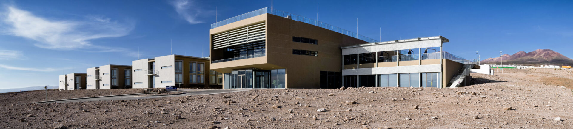 A vast hotel stands in the desert