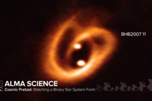 Cosmic Pretzel: Watching a Binary Star System Form